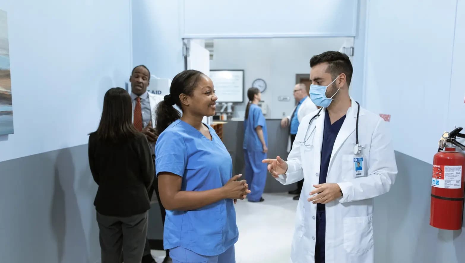 Medical professionals talking in a hospital scenario