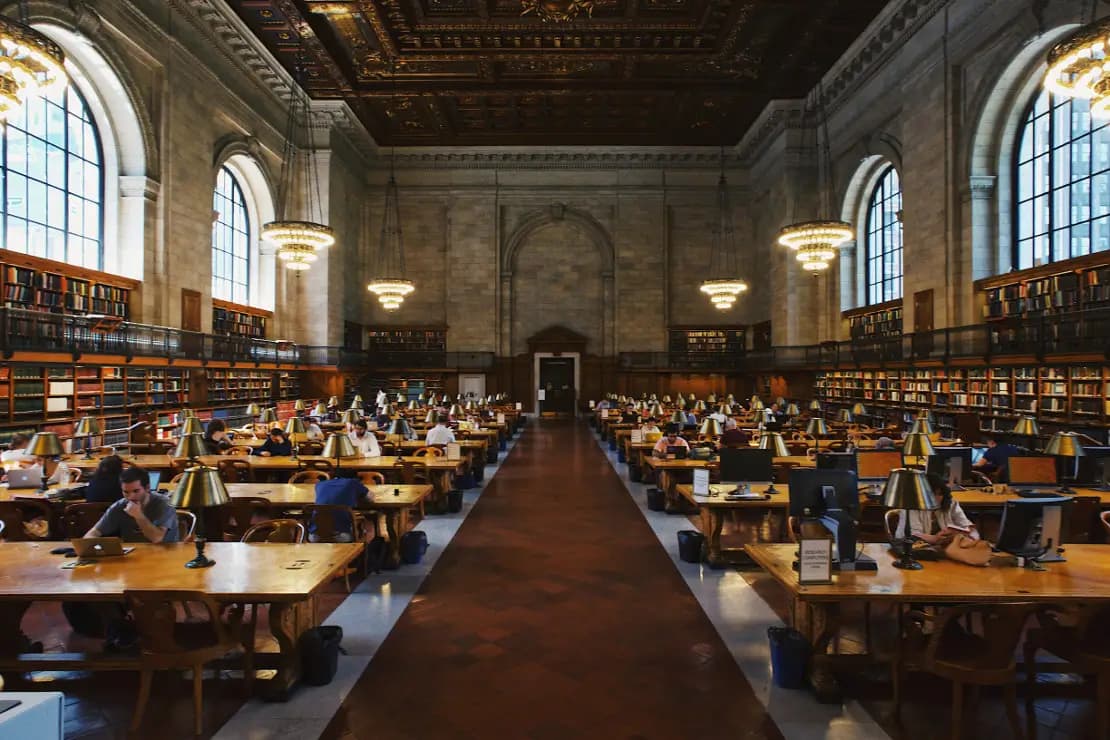 University library with students learning at desks