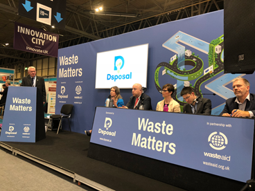 Photograph of Waste Matters theatre with Ray Georgeson - Resource Association (chair), Sophie Walker - Dsposal, Jon Hastings - London Borough of Newham, Rachel Scarisbrick - Keep Britain Tidy, Alistair Paul - Defra, Dan Cooke - Pennon Group/ESA.